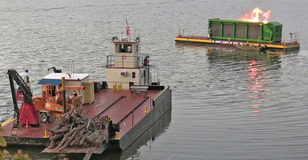Feeder Barge (left) taking Wood Waste to FireBox